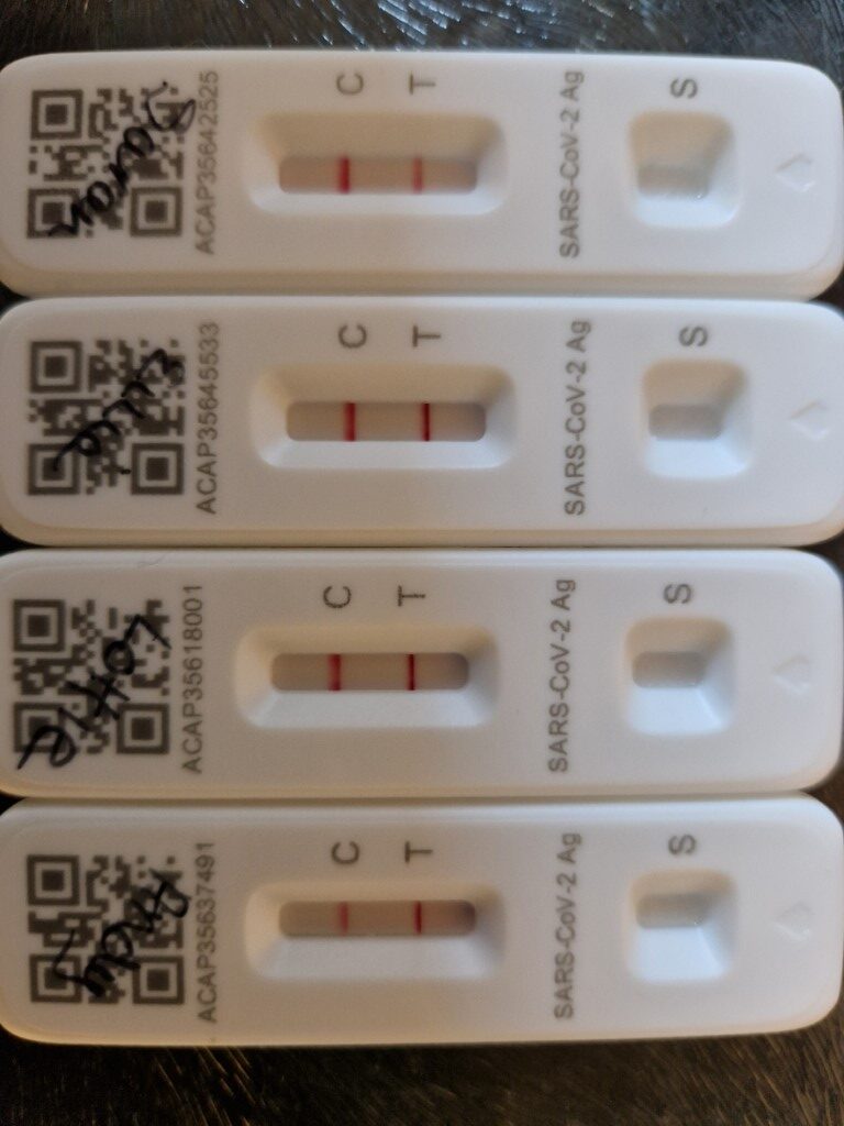 Image of positive covid test strips